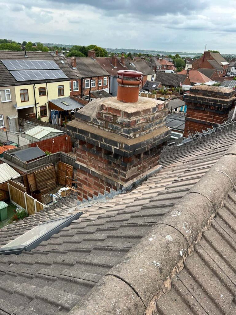 This is a photo taken from a roof which is being repaired by Hassocks Roofing Repairs, it shows a street of houses, and their roofs